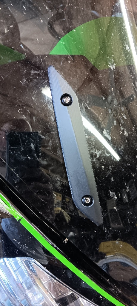 Windshield cover trim