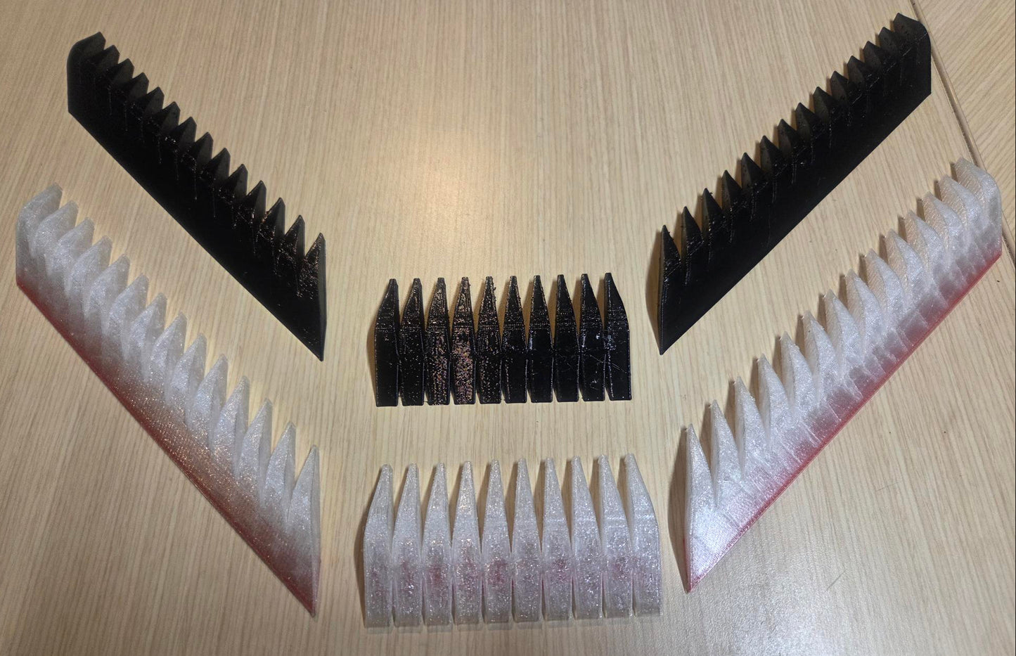 this picture shows a complete set of black and clear airfoils from the back, uninstalled.